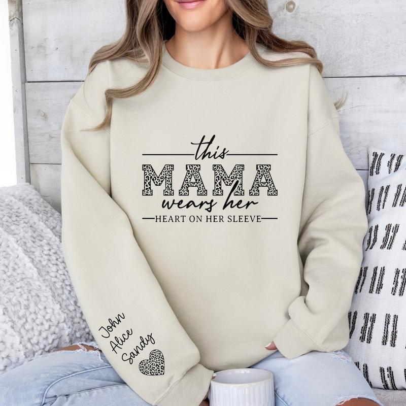 Custom Mama Sweatshirt With Kids Names On Sleeve, This Mama Wears Her Heart On Her Sleeve, Mom Christmas Crewneck Sweater, Mothers Day Gift for Mom