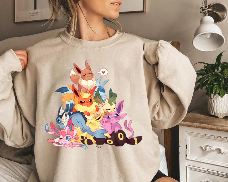 Eevee Eeveelution Sweatshirt, Slyveon, umbreon, Espeon, Flareon Anime, Vintage Anime Sweater, Anime lover gift, Anime merch, Anime Lover Sweatshirt, Hoodie Gift, Gift for anime fan, Sweater, Anime Gift, Kawaii