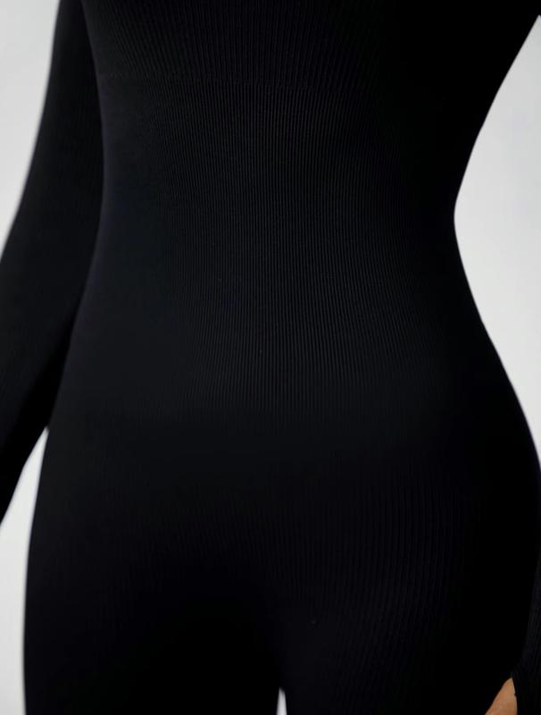 Women's solid ribbed long sleeve bodysuit jumpsuit. Tight fitting tummy control one piece. Spring and Summer perfect